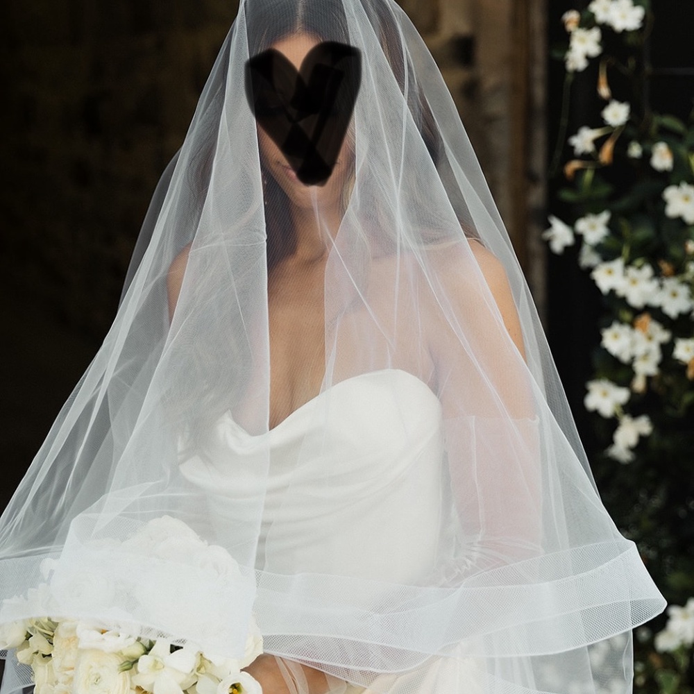 Beautiful white trim wedding veil